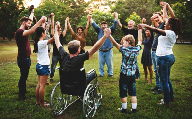 community holding hands